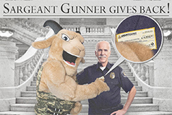 Image of Sarge handing over a check to the Thin Blue Line Foundation