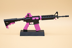 The black and pink AR-15 model The black and pink AR-15 model