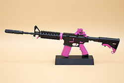 The black and pink AR-15 model The black and pink AR-15 model