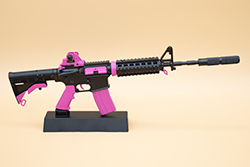 The black and pink AR-15 model The black and pink AR-15 model
