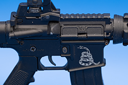 Gadsden Flag snake printed Receiver Image of a receiver with the Gadsden Flag snake printed on the mag-well.