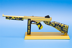 The gold and black TSMG model