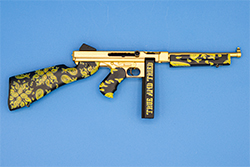 The gold and black TSMG model